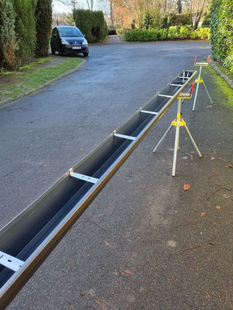 Installation de gouttières près de Arpajon